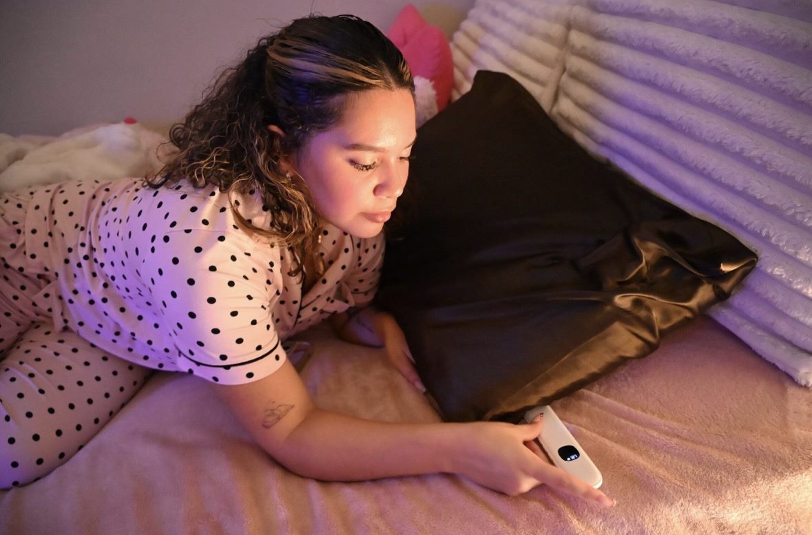 Lullabar pillow speaker placed under a pillow